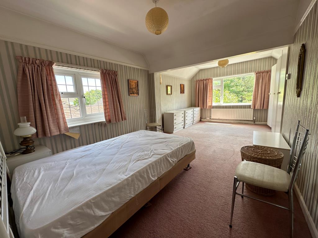 Lot: 63 - DETACHED HOUSE FOR REPAIR WITH POTENTIAL - Bedroom one with dual aspect windows